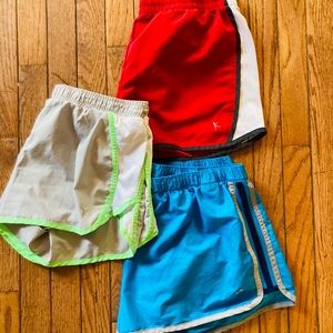 Three pair of athletic shorts, size Medium